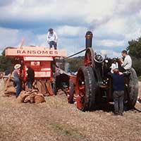 Traction engine drives thresher