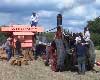 Ransomes threshing machine driven by steam traction engine